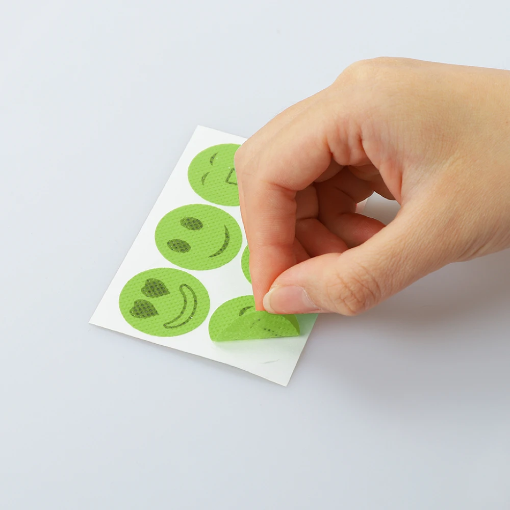 How do I use my BuzzBGone Mosquito Repellent Stickers?
